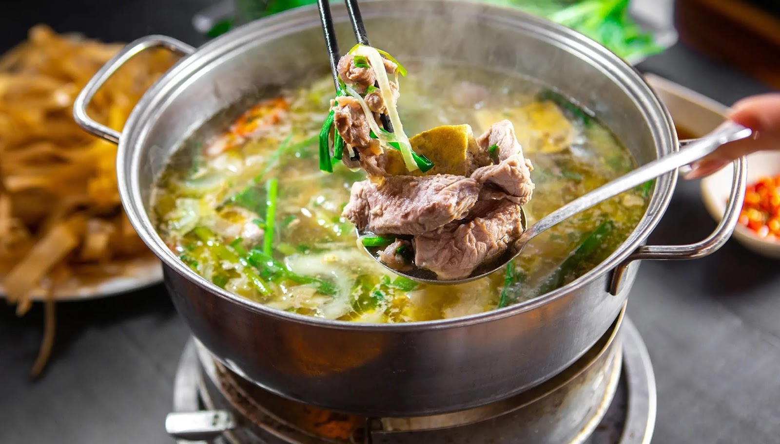 Enjoy delicious young beef hotpot at Minh Det Young Beef.